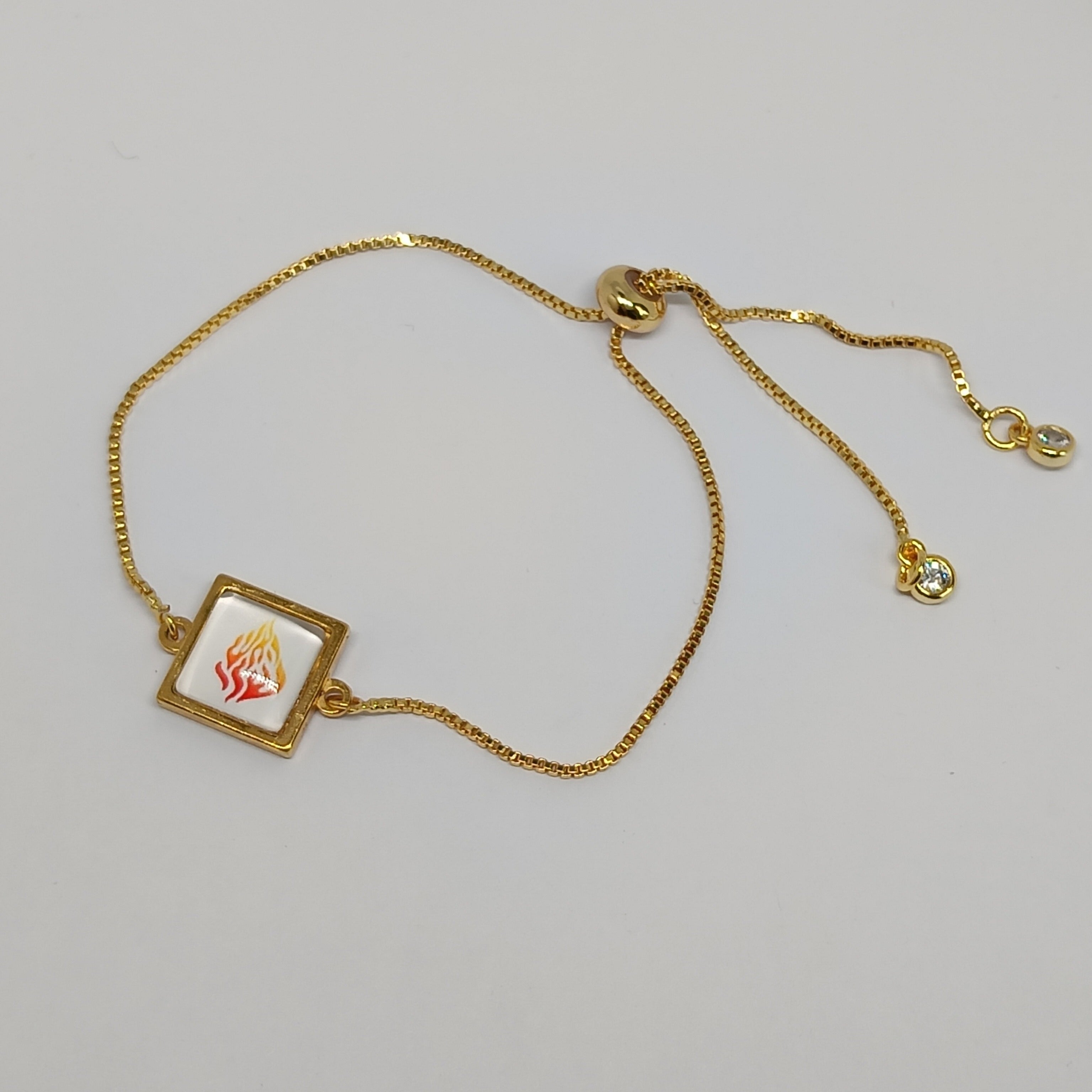 Bracelet coulissant doré – Cabochon “Flamme Breslev”